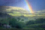 A vibrant rainbow arcs over sunlit hills at Ladies View in Killarney National Park. By Michael Rung Photography