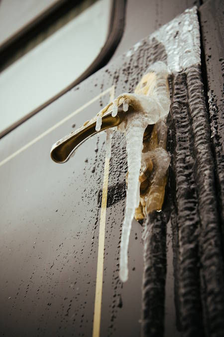 Frozen handle caused by leaking pipes.