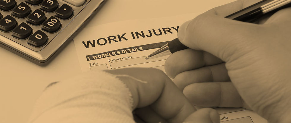 Injured person filling out worker's comp claim papers.