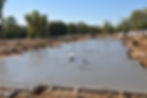 Finished concrete slab foundation prepared for residential construction