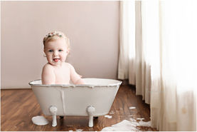 messy cake smash, bath time, and playful moments that
