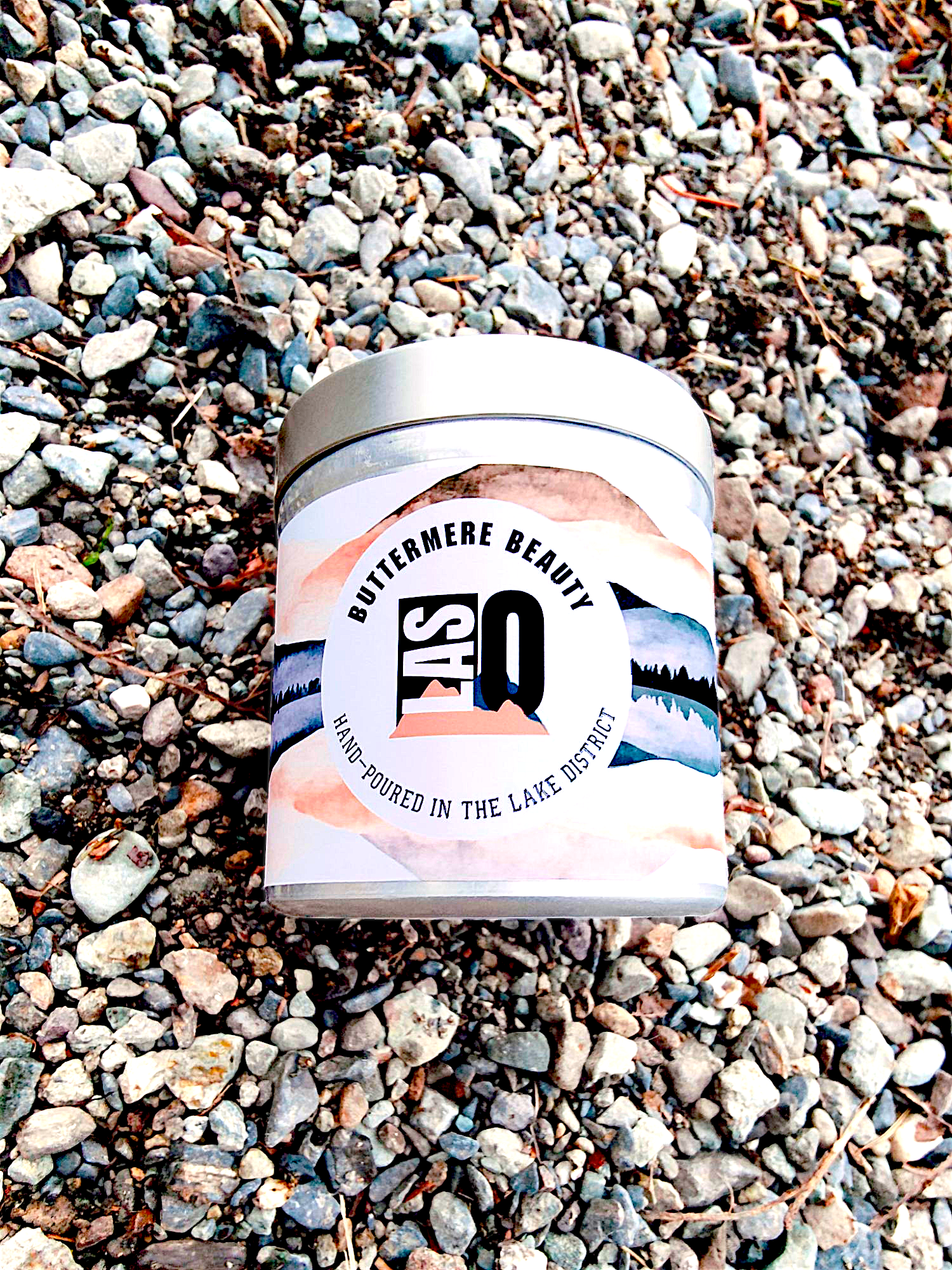 LASO Buttermere beauty soy wax candle in a tin. A water floral therapy scent