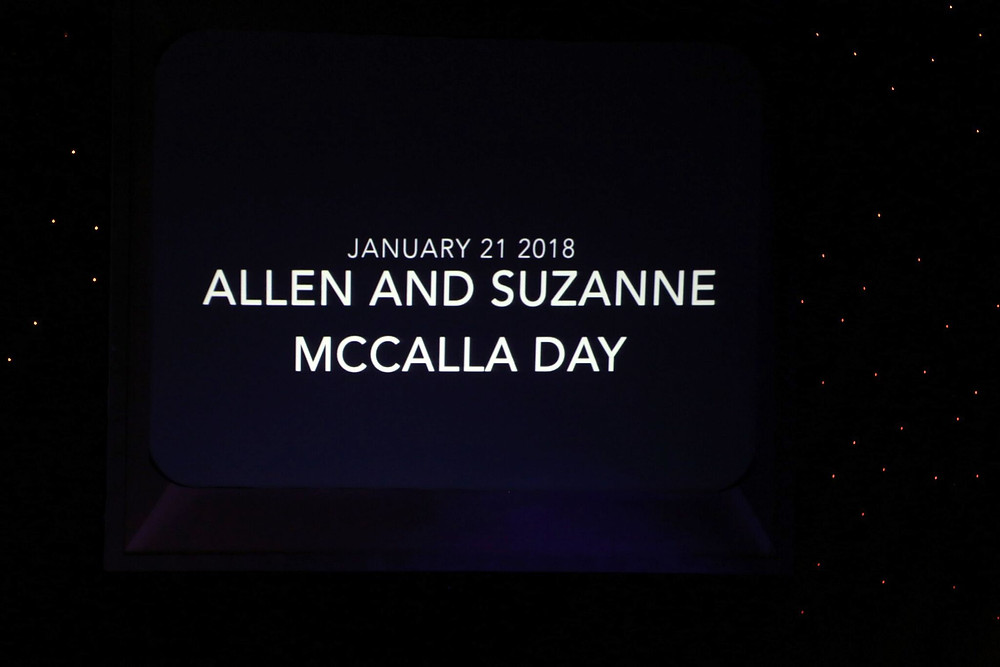 Powerpoint announcing January 21st, 2018 as Allen and Suzanne McCalla Day