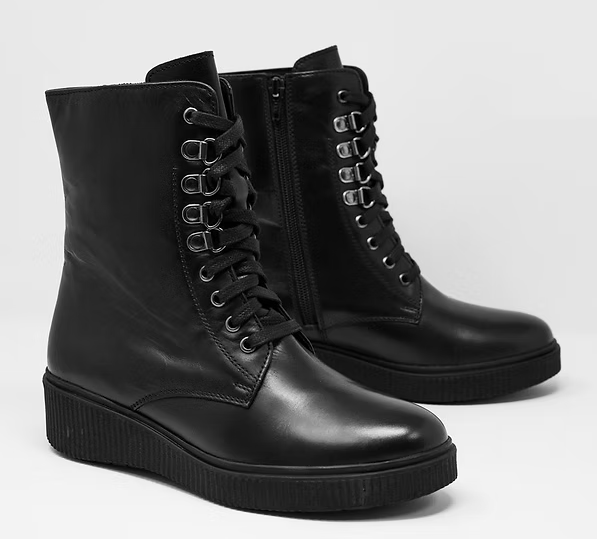Pair of black lace-up combat boots with side zippers, shown on a clean white background.