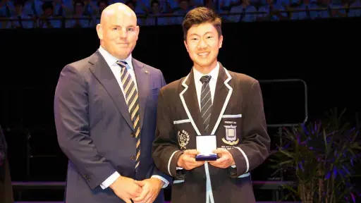 David Sun, Dux of Brisbane Grammar School accepting the lilley gold medal for the dux of brisbane grammar school in 2023.