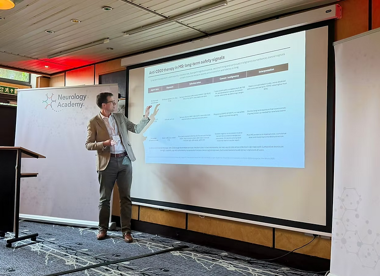 Dr Will Brown is shown presenting study outcomes at an MS Academy Roadshow in Norwich, run by Neurology Academy