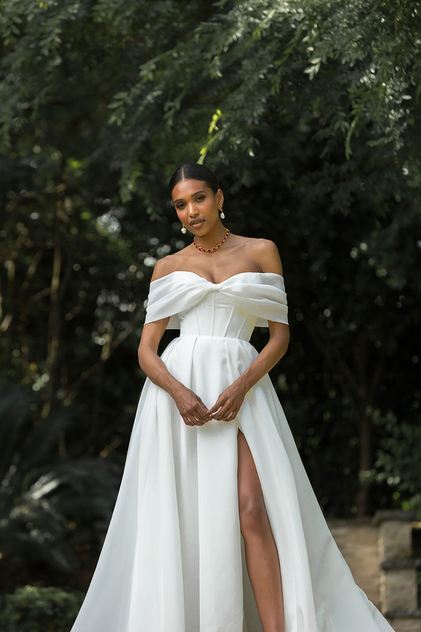 Madi Lane
Wedding Dress
White Ball Gown