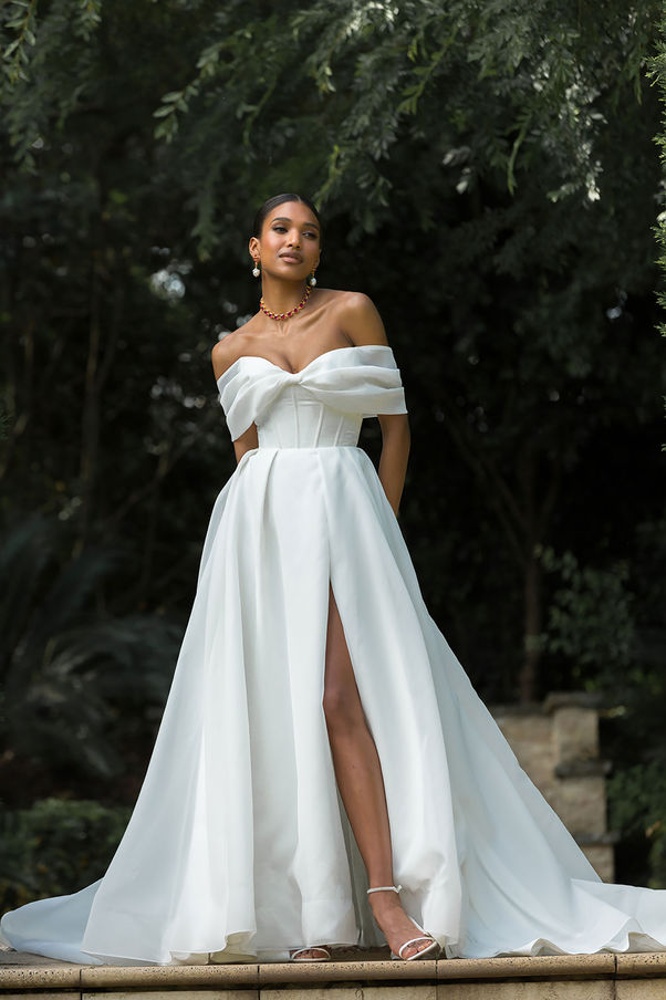 Madi Lane
Wedding Dress
White Ball Gown