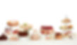 Table with loads of cupcakes and cakepops and birthday cakes.jpg