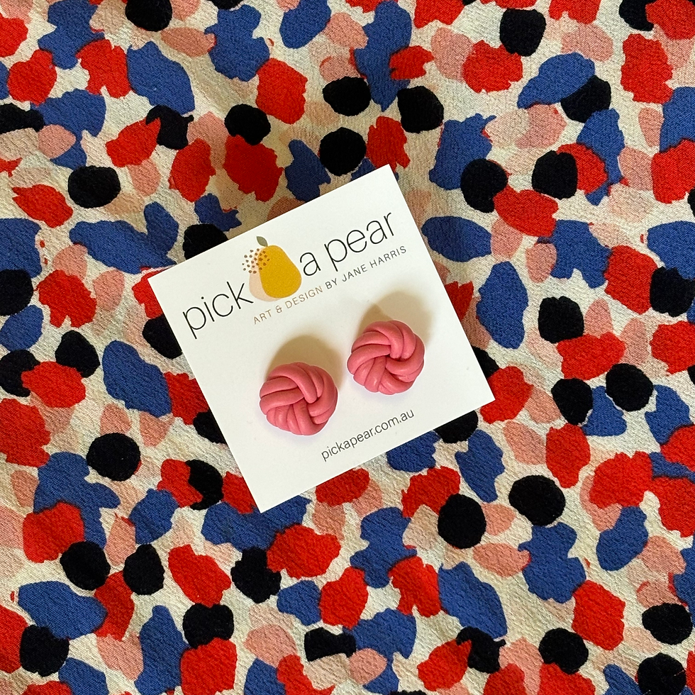 Thumbnail: Molly Knotted Stud Earrings in Guava Pink