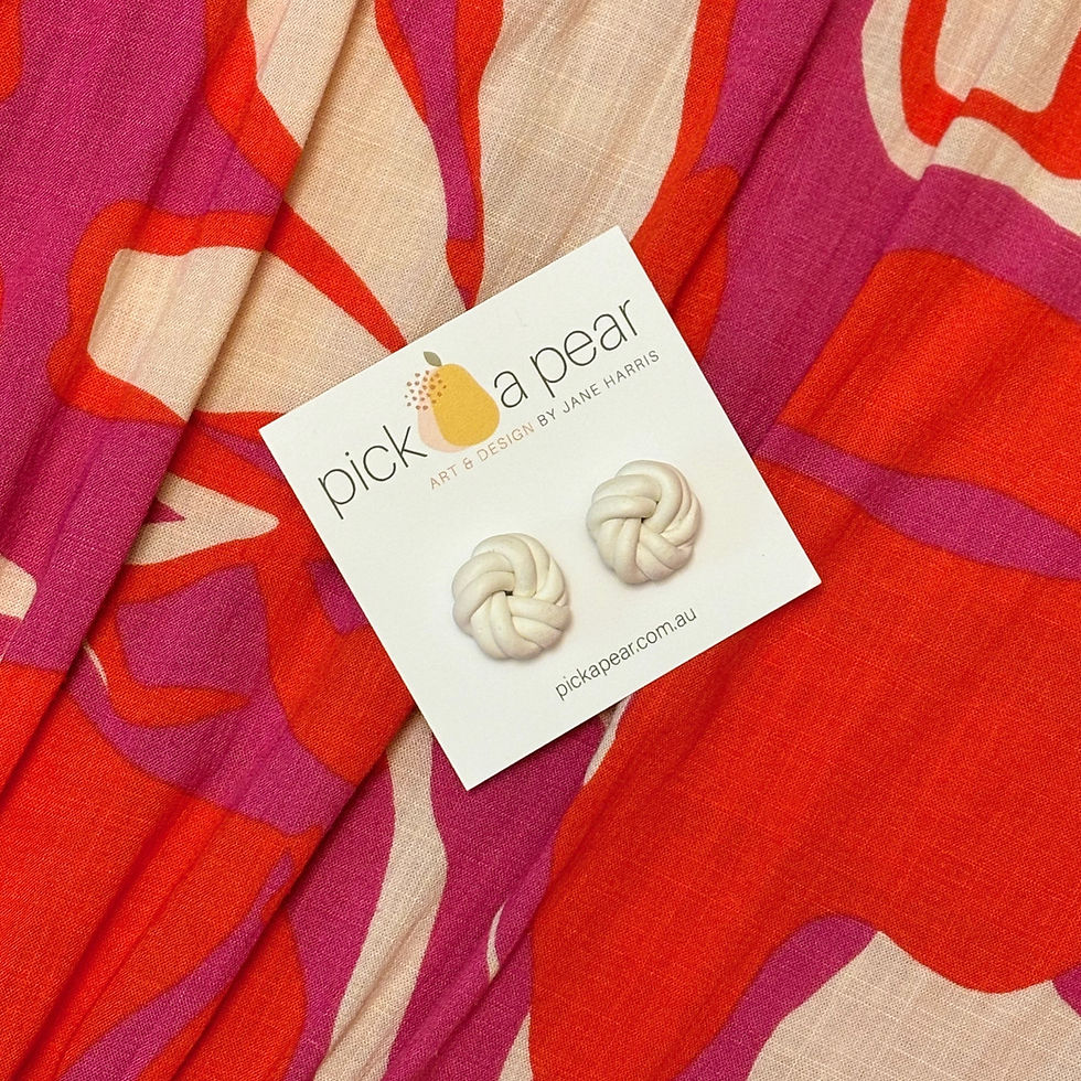 Thumbnail: Molly Knotted Stud Earrings in White