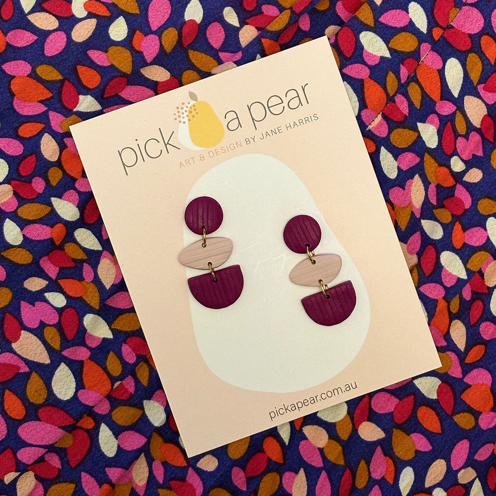 Thumbnail: Trinity Dangle Earrings in Plum Kisses