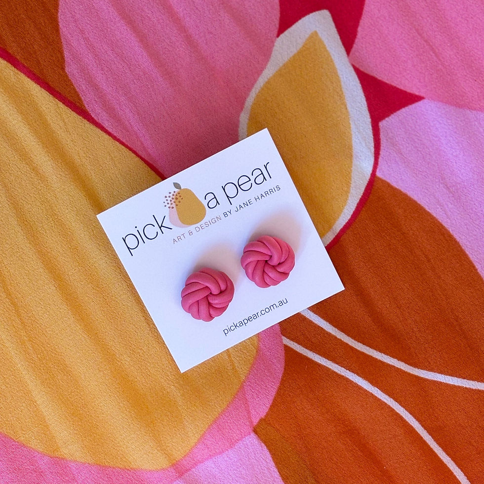 Thumbnail: Molly Knotted Stud Earrings in Guava Pink