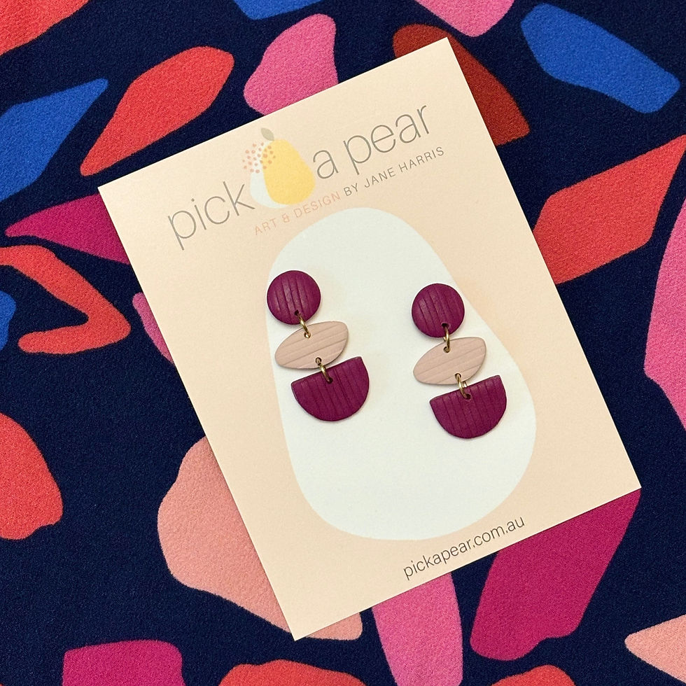 Thumbnail: Trinity Dangle Earrings in Plum Kisses