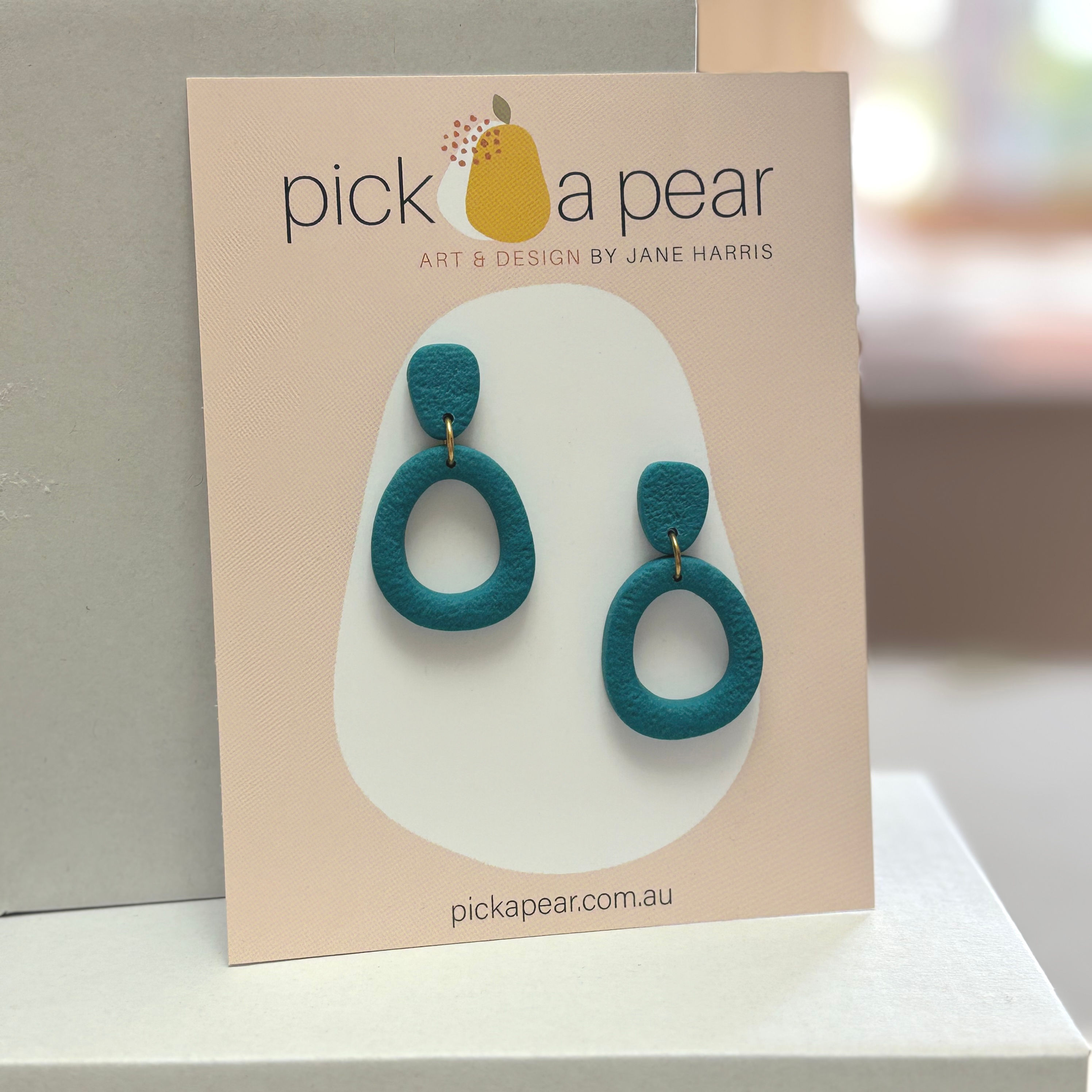 Nellie Dangle Earrings in Sea Glass Teal Green