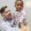 Shane holding happy baby