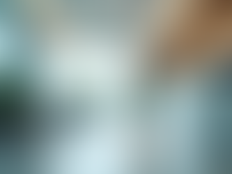 Palm Medical provider offering holistic healthcare consultation to a patient in a calm clinical setting.