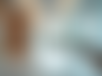 Doctor consulting a satisfied patient in a modern healthcare clinic.