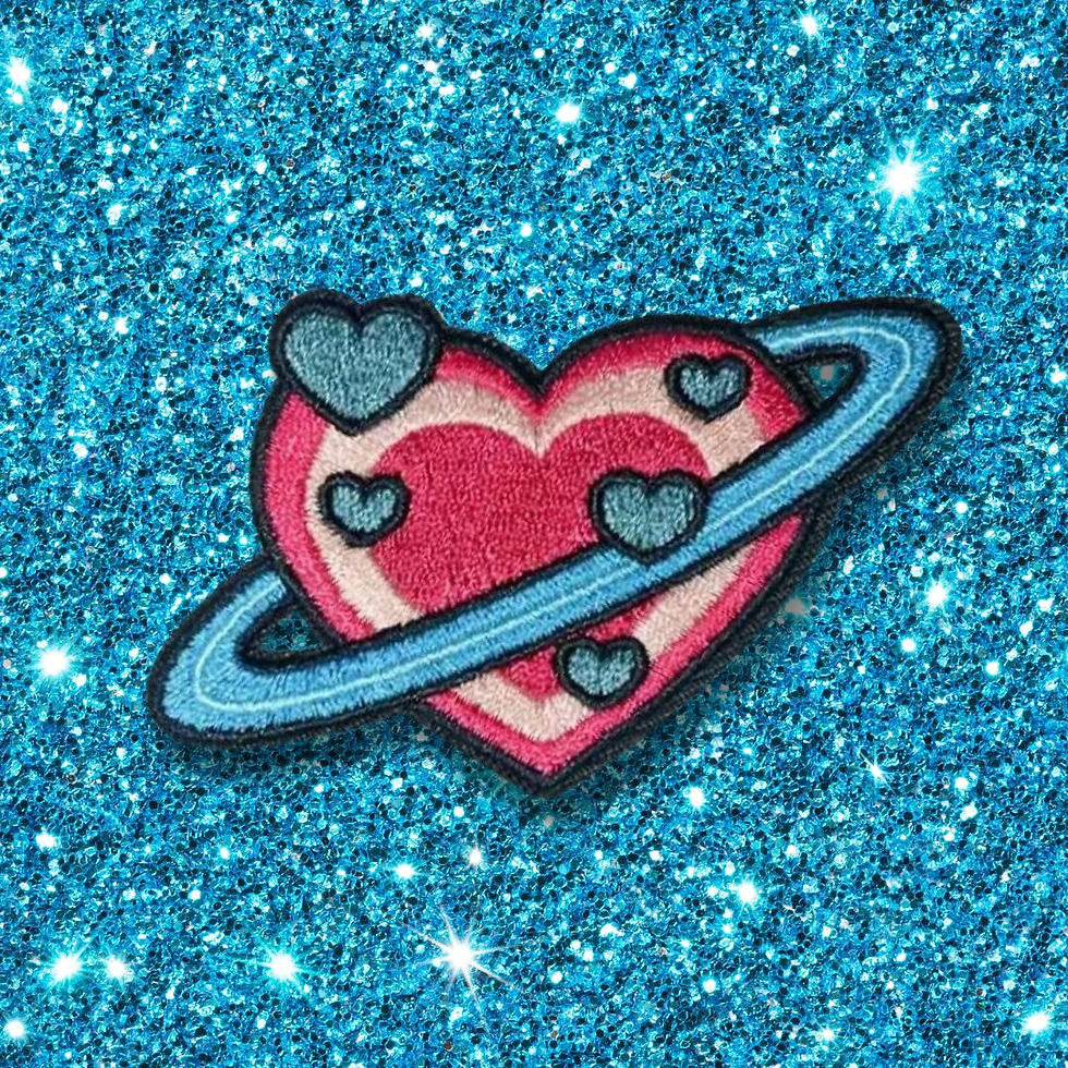 Heart patch with planets and moons on a glitter background. Outta Space Heart Patch.