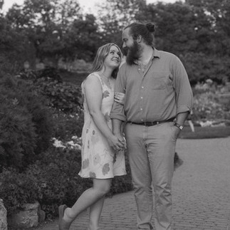 A heartfelt proposal at the romantic Sunken Gardens in Lincoln, NE, capturing the moment she said ye