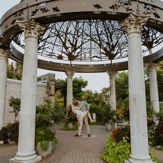 A heartfelt proposal at the romantic Sunken Gardens in Lincoln, NE, capturing the moment she said ye