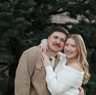 Engagement session at Nebraska State Capitol Lincoln NE in cozy outfits.