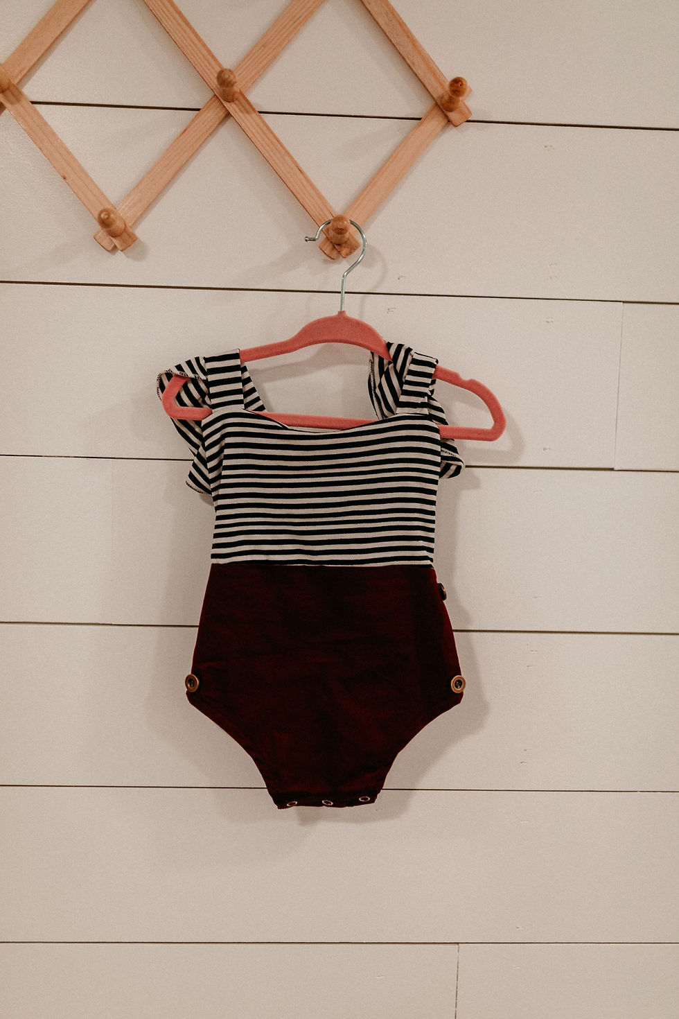 6 Months | Black and burgundy striped onesie