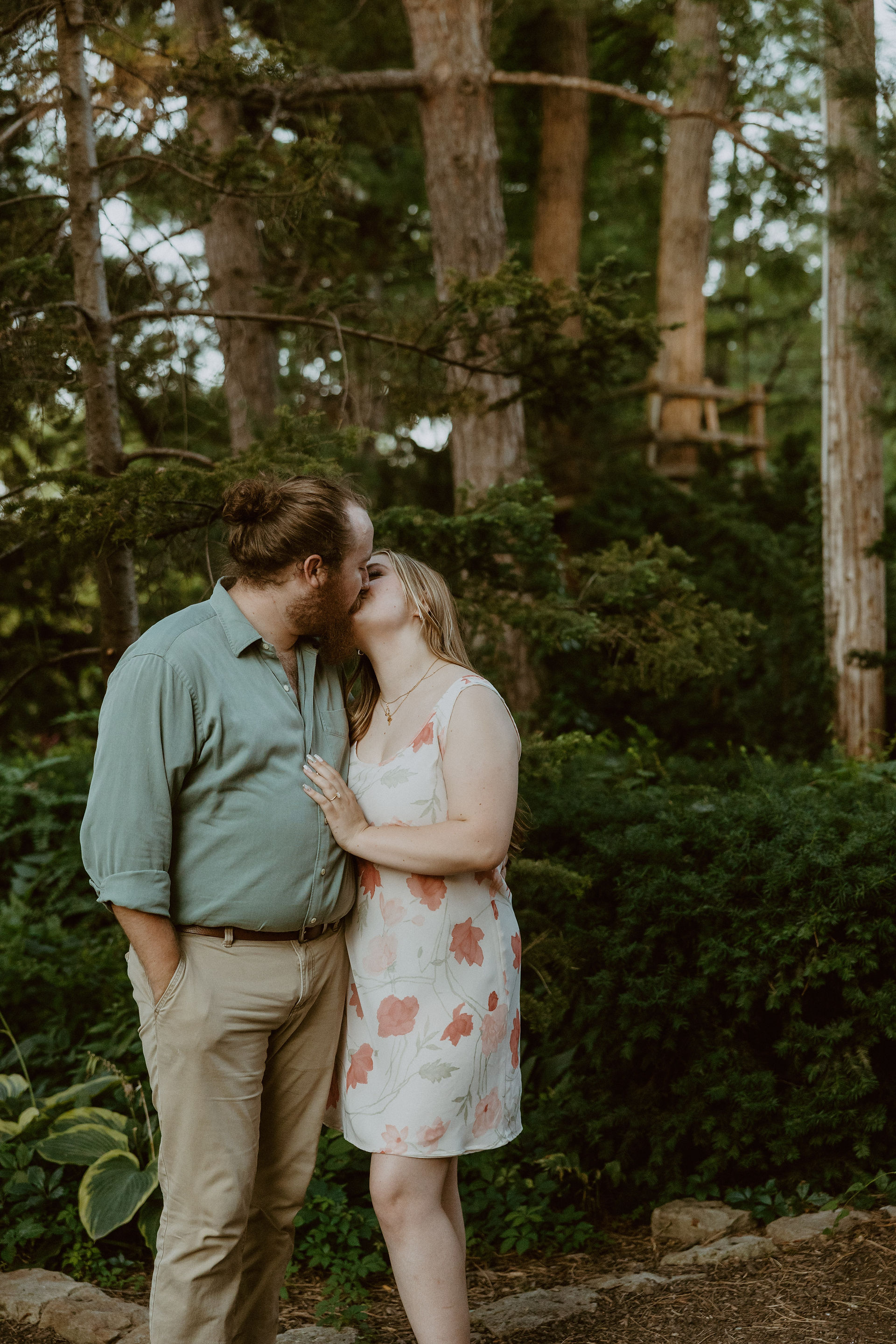 A heartfelt proposal at the romantic Sunken Gardens in Lincoln, NE, capturing the moment she said ye