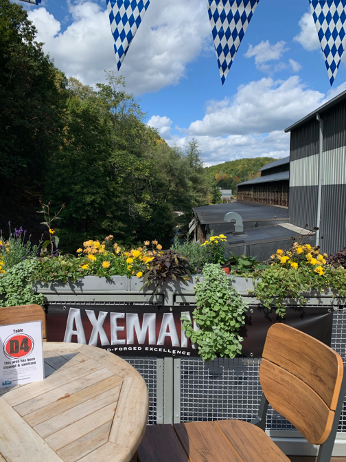 Axemann Brewery located in Central PA, Centre County Pennsylvania, beer, craft beer, lager, pilsner, hazy IPA, hops, things to do in PA, food and drink in PA, weekend activities in Pennsylvania, Bellefonte, State College, fun new restaurant, beer garden, outdoor seating, fun atmosphere, industrial, adventure, Nature Inn, good vibe, family activities