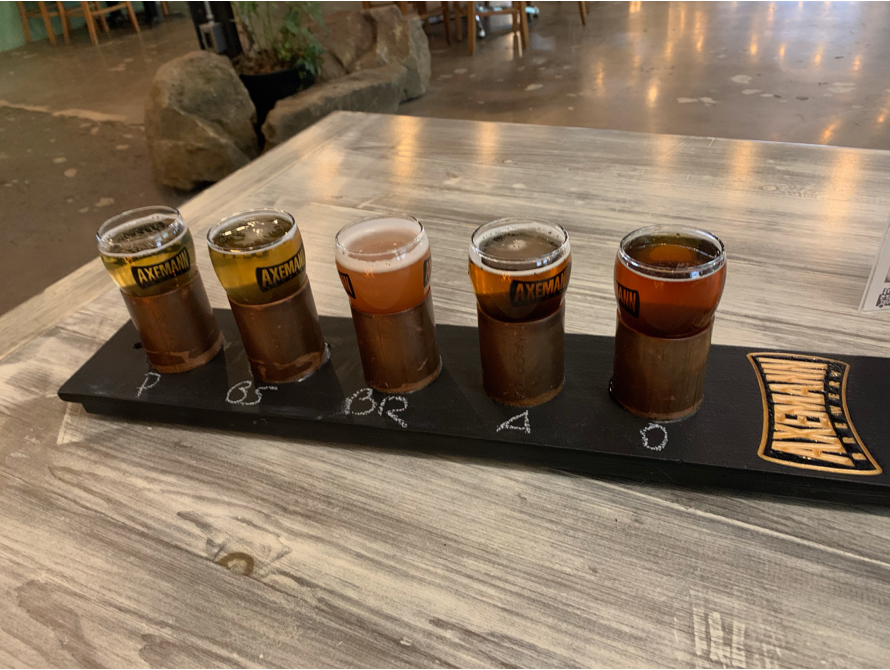 Axemann Brewery located in Central PA, Centre County Pennsylvania, beer, craft beer, lager, pilsner, hazy IPA, hops, things to do in PA, food and drink in PA, weekend activities in Pennsylvania, Bellefonte, State College, fun new restaurant, beer garden, outdoor seating, fun atmosphere, industrial, adventure, Nature Inn, good vibe, family activities