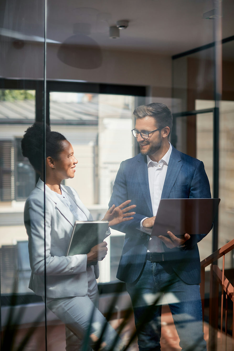 Two people having a discussion at work