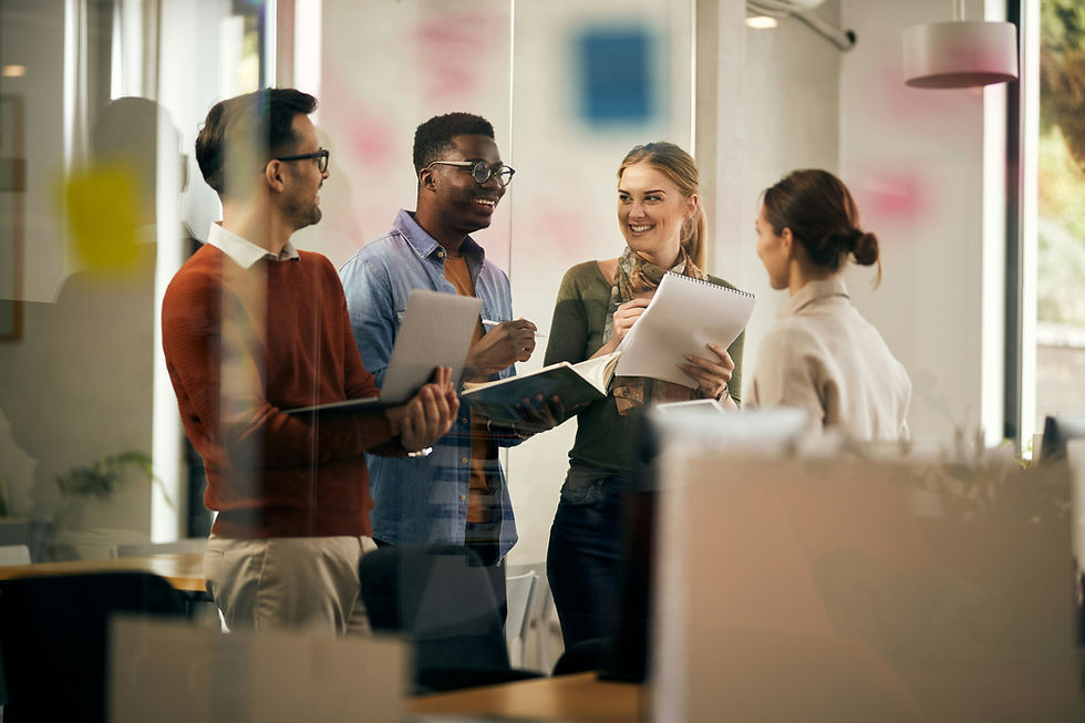 people working in an office, collaborating