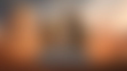 Basim and another character stand in the desert beside ancient ruins, representing the Assassin’s Creed Mirage Valley of Memory expansion.