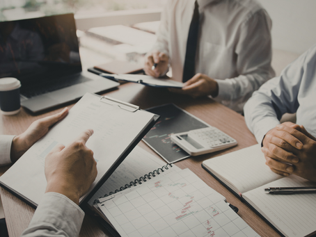 Atlanta business owner doing financial planning before selling a business with advisors