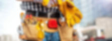 Man wearing tool belt putting on work gloves