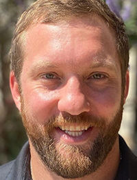 Austin Stocken is AISD's first head wrestling coach.