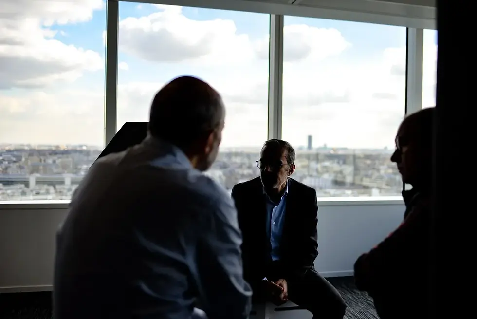discussion between 3 business people