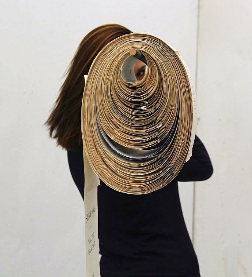 Roll of stapled book pages, 2015