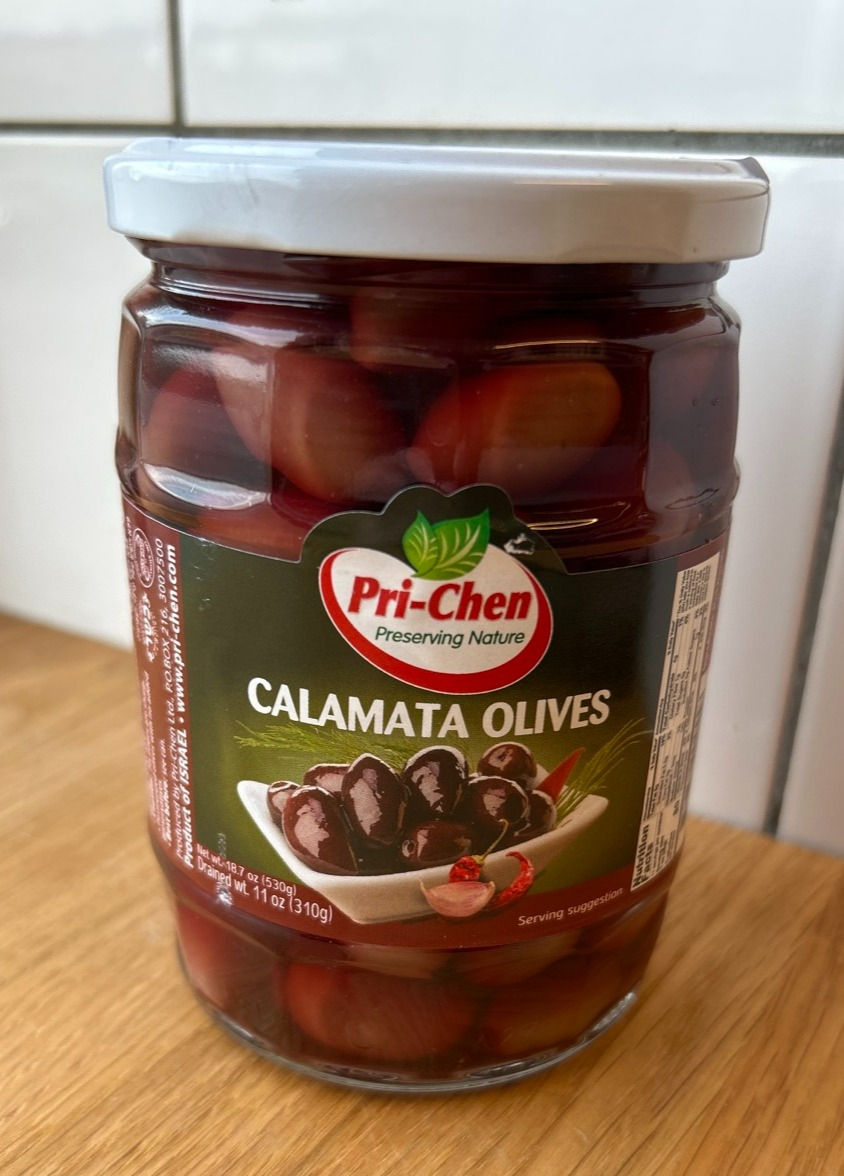 Sorte Kalamata oliven i glas. 530 g.