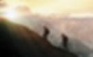 Climbers on a mountain ridge at sunset_Buena Vista Images-RF-GettyImages-597806063.jpg