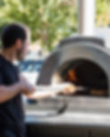 Vianto and Co Cooking Wood Oven Pizzas