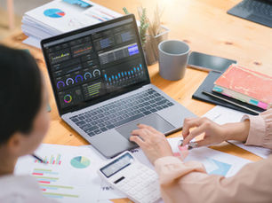 Accountant reviewing financial data and business analytics with modern accounting technology