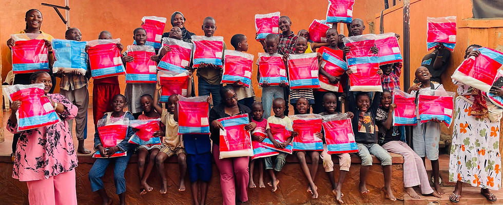 donating and distributing Mosquito nets to orphaned children
