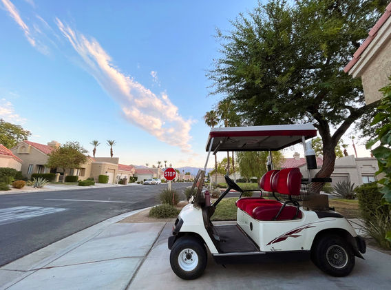 Golf cart parking front of the garage