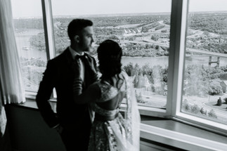 couple getting ready together for their wedding party