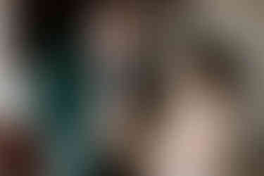 couple getting ready together for their wedding party