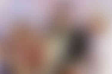 newly married couple happily looking at eachother