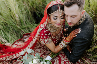 couples portrait of a hindu fusion couple at an Edmonton park called Rainbow Valley