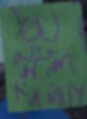 Post it note reading 'We are Afton Family' 