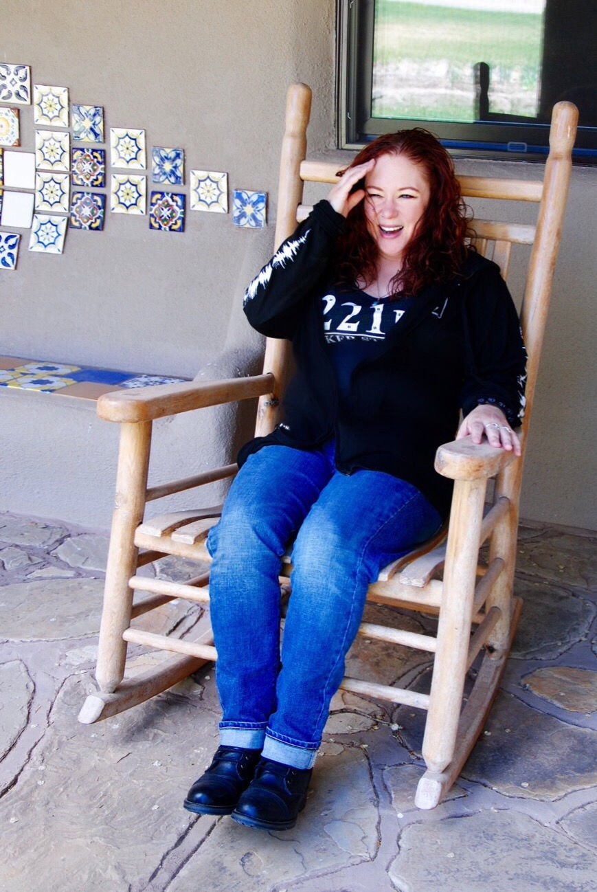 me laughing on Brewer's porch